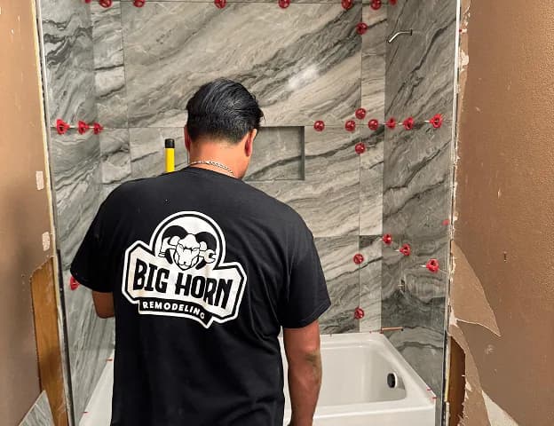 Bathroom remodeling contractor completing tile work in Las Vegas, NV