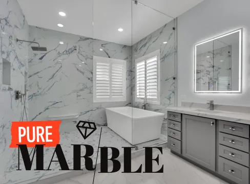 Bathroom remodel in Paradise, Las Vegas - marble-look slabs and polished chrome trim | Big Horn Remodeling