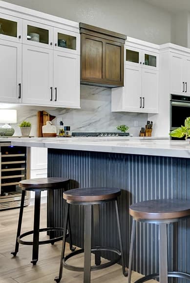 Completed remodel in a Las Vegas neighborhood with blue cabinetry and updated interior finishes