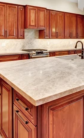 Completed remodel in a Las Vegas neighborhood with red cabinetry and updated interior finishes