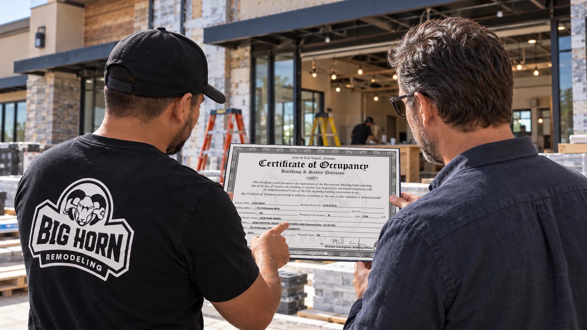 Illustrative image of two people reviewing a Certificate of Occupancy in front of a commercial interior under construction.