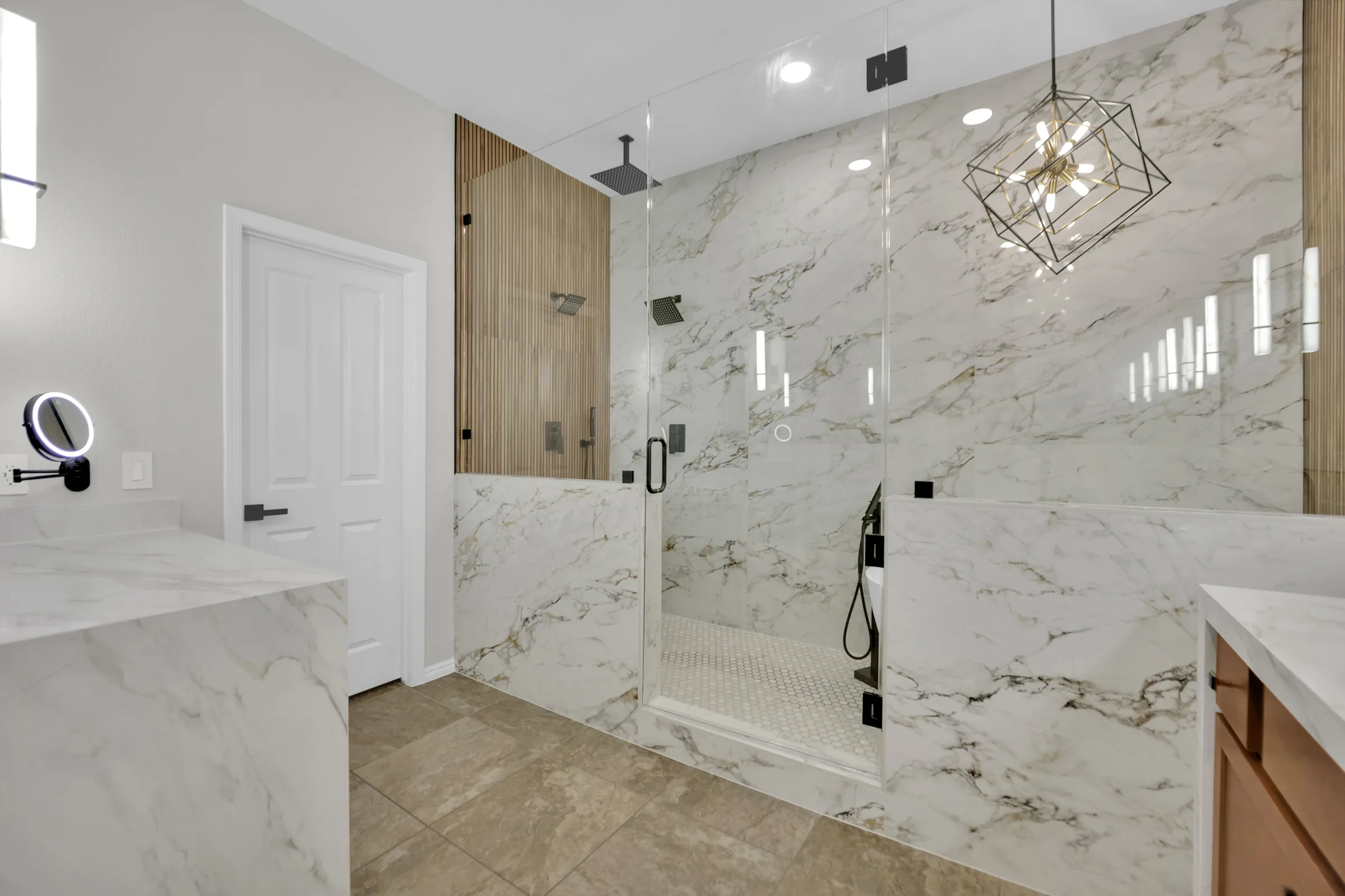 Full wet-room enclosure with a central glass door, pony walls, and fluted side walls.